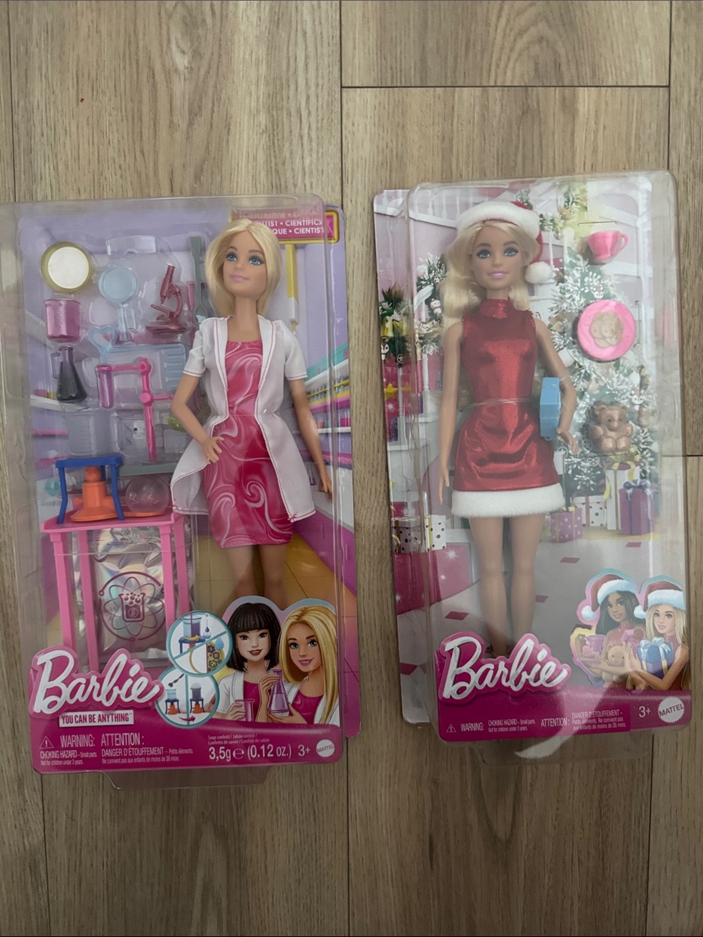 2 brand new Barbie dolls scientist and santa